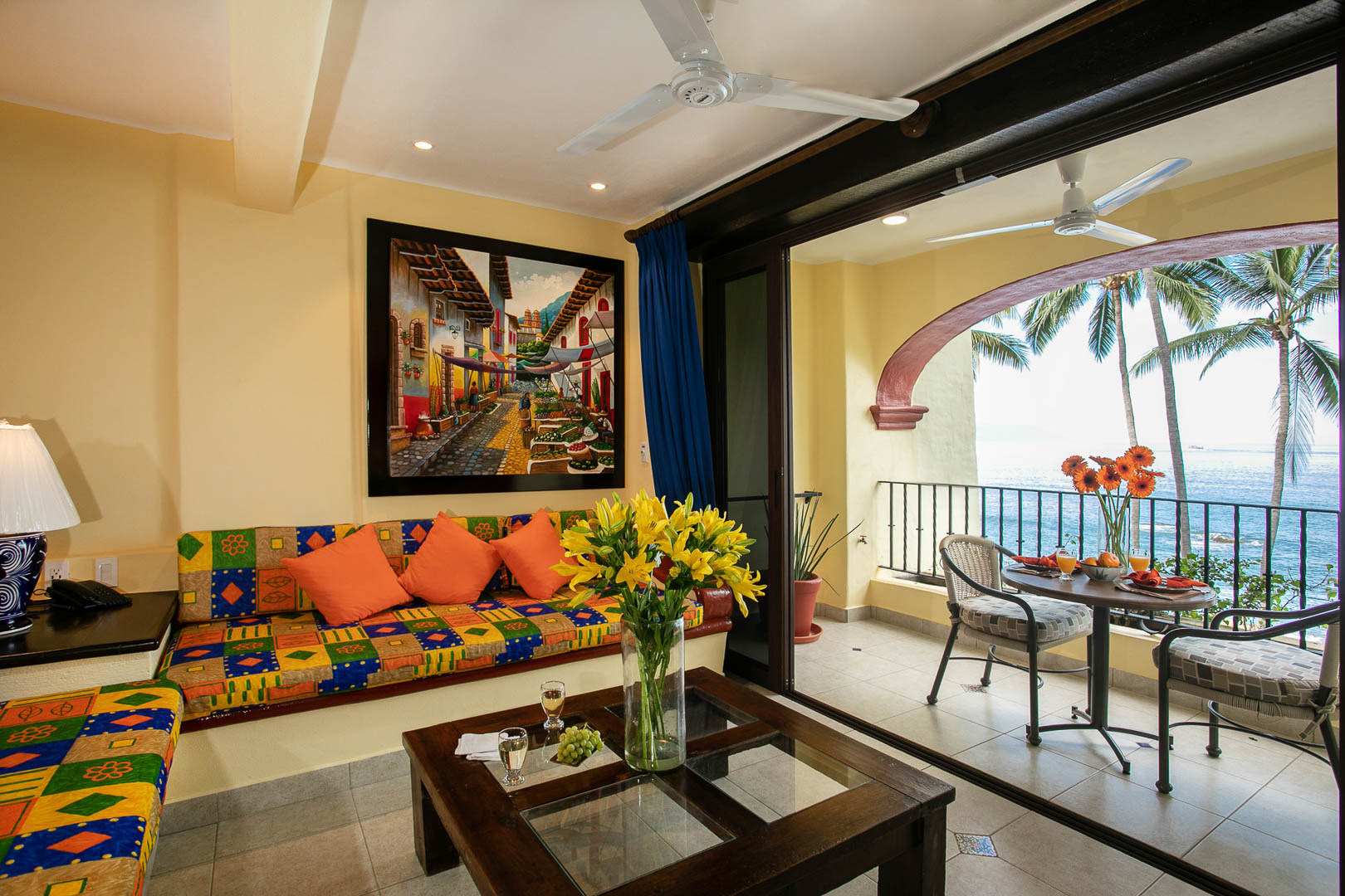 An airy living room, with a balcony overlooking the ocean at TPI's Lindo Mar Resort in Puerto Vallarta, Mexico.